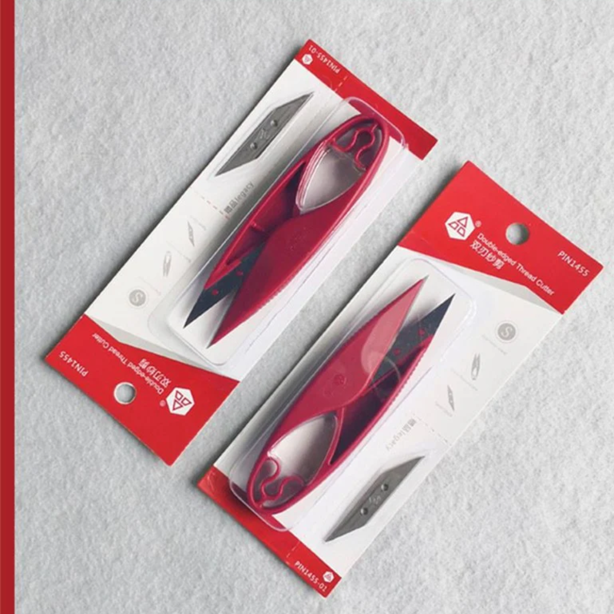 Thread clipper with replacement blade